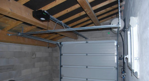 Photo de galerie - Installation porte garage avec motorisation 
