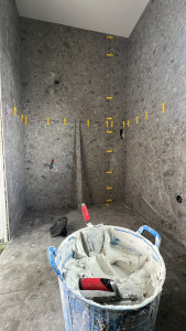 Photo de galerie - Pose de faïence 1 m par 1 m dans la salle de bain