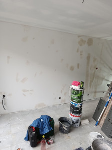 Photo de galerie - Reprise enduit finition avant peinture 