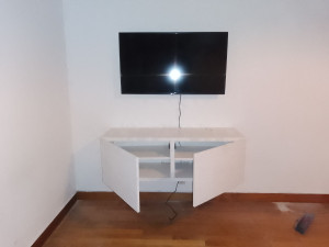 Photo de galerie - Installation de TV et meuble fixé au mur