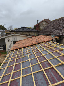 Photo de galerie - Changement de couverture avec redressage 