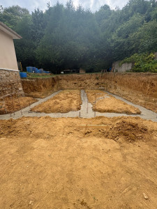 Photo de galerie - Terrassement sur fondation + coulage béton 