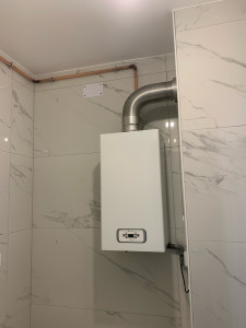 Photo de galerie - Installation de chaudière cheminée ✅