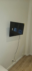 Photo de galerie - Fixation murale téléviseur 