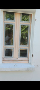 Photo de galerie - Protection des vitres.  avant la peinture 