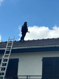 Photo de galerie - Remise en peinture de la toiture avec pistolet