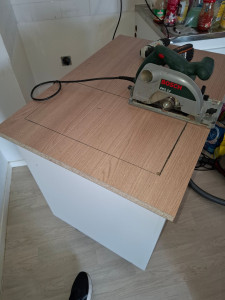 Photo de galerie - Insertion d'une plaque Vitrocéramique