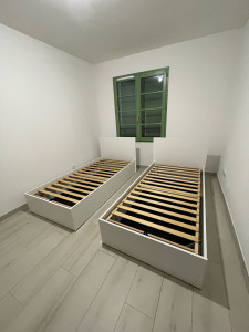 Photo de galerie - Montage de deux lit simple