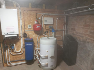 Photo de galerie - Installation de systèmes chaudière hybride pompe à chaleur est gaz naturel 