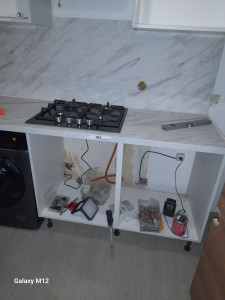 Photo de galerie - L'opération de pose les cuisines 