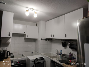 Photo de galerie - Montage et fixation éléments de cuisine au plus luminaire