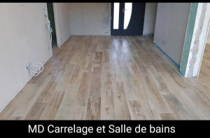 Photo de galerie - Pose d'un carrelage effet parquet 