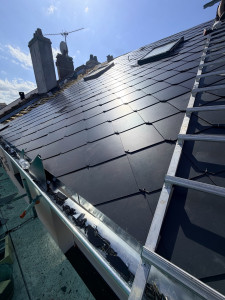 Photo de galerie - Réfection d’une toiture en fibro ciment/pose de velux/réfection de la zinguerie 