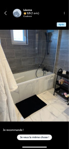 Photo de galerie - Rénovation de la salle de bain (faïence, carrelage au sol, installation de la baignoire et mitigeur)