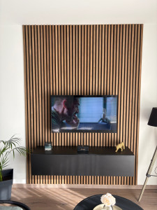 Photo de galerie - Pose meuble tv+support tv+habillage bois 