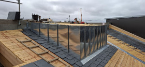 Photo de galerie - Réalisation d'une lucarne en joint debout. 
