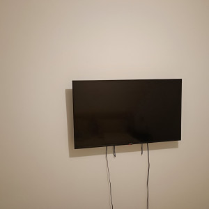 Photo de galerie - Fixation d'un téléviseur sur un mur 