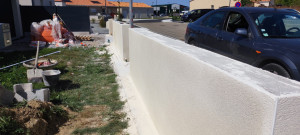 Photo de galerie - Création d'une fondation, muret de clôture et enduit