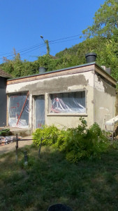 Photo de galerie - AVANT - Réparation des 2 façades + finition en enduit taloché à la chaux .