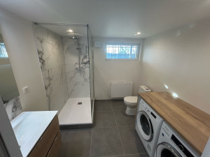 Photo de galerie - Création d’une salle de bain dans un sous-sol avec reprise, eau chaude, eau froide sanitaire excusassions. 