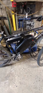 Photo de galerie - Électrification d'un VTT avec moteur roue
 arrière .
