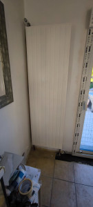 Photo de galerie - Après
Mise en place radiateur panneau avec départ et retour.