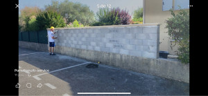 Photo de galerie - Montage mur clôture 