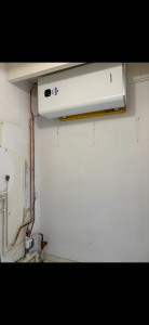 Photo de galerie - Pose d'un chauffe-eau électrique plat suivant la demande du client.