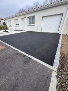 Photo de galerie - Réalisation d’un enrobé sur la commune de vieillevigne 