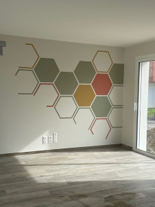 Photo de galerie - Réalisation d'un décor personnalisation pour un mur tv