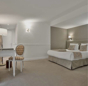 Photo de galerie - Une chambre propre, agréable et accueillante pour les clients.
