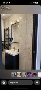 Photo de galerie - Pose de faïence, effet marbre avec baguette de finition couleur. Or