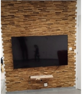 Photo de galerie - Pose de plaque en bois et télé intégrée