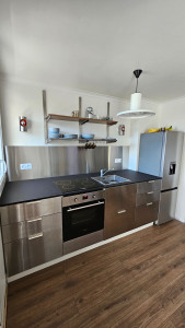 Photo de galerie - Réalisation d'une cuisine complète sur mesure, plomberie électricité comprise, pied sur mesure pour hauteur adapté 