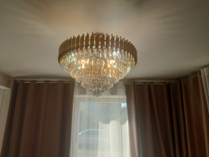 Photo de galerie - Installation tringle a rideaux et installation de lustre 