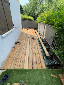 Photo de galerie - Réalisation d’une terrasse sur plot 