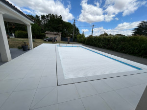 Photo de galerie - Poser carrelage sol  60x60  Autour de piscine 