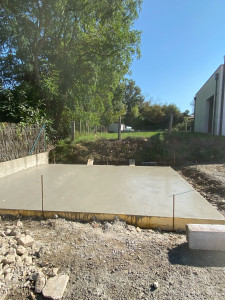 Photo de galerie - Dalle béton pour support de cabanon de jardin 