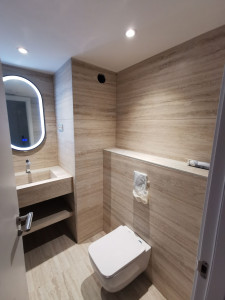 Photo de galerie - Instalation de toilette encastré, une douche italienne, une lavabo
