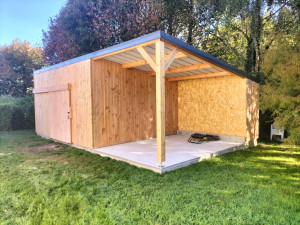 Photo de galerie - Réalisation d'un garage et préau ossature bois 