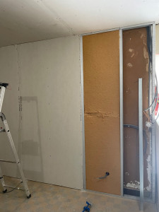 Photo de galerie - Pose de rails + isolation + placo 