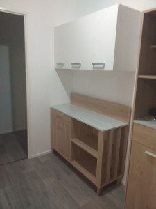 Photo de galerie - Montage et pose au mur meubles hauts