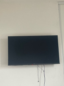 Photo de galerie - Fixation d’une télévision au mur 