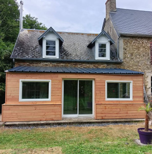 Photo de galerie - Véranda complètement supprimée , avec création d'un muret, ossature bois , fourniture et pose des menuiseries..