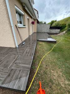 Photo de galerie - Terrassement 
Coffrage et coulage dalle
Finition carrelage 