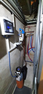 Photo de galerie - Installation d'un adoucisseur au CO2 de chez Décalc ainsi qu'un surpresseur Grundfos connecté