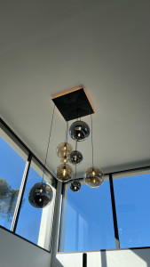 Photo de galerie - Lustre sur vide séjour 