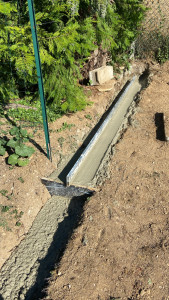Photo de galerie - Création d’une semelle pour muret extérieur