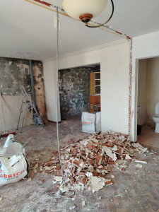 Photo de galerie - Démolition d'un mur pour ouvrir le salon. 