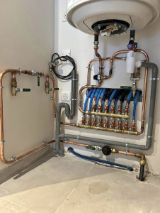 Photo de galerie - Installation d'une nourrice raccordement chauffe-eau électrique  150L 